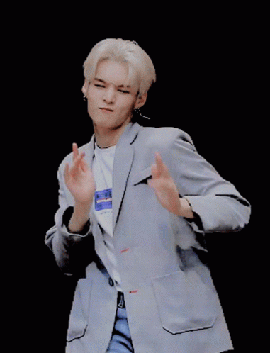 A Man Wearing A Jacket And A T-Shirt That Says ' Aderk ' On It GIF
