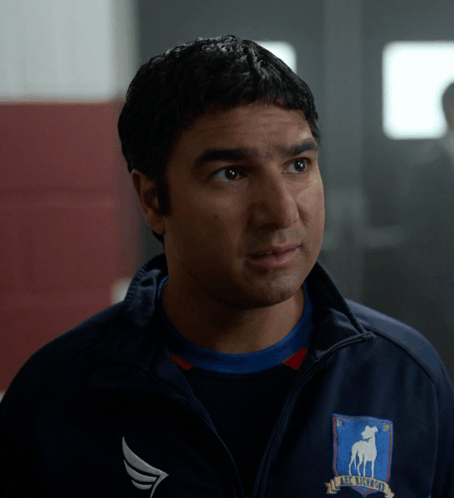 A Man Wearing A Jacket That Says Boston Bruins On It GIF