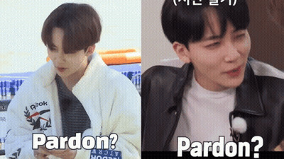 A Man Wearing A Jacket That Says Pardon Next To Another Man GIF