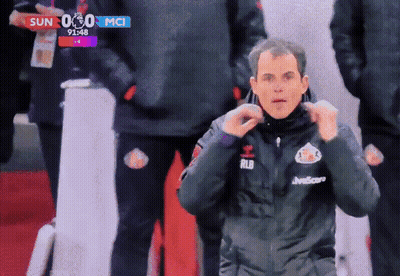 A Man Wearing A Jacket That Says Rld On The Front GIF