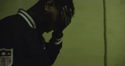 A Man Wearing A Jacket With The Word Wealth On The Back GIF