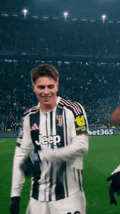 A Man Wearing A Jeep Jersey Stands On A Field GIF