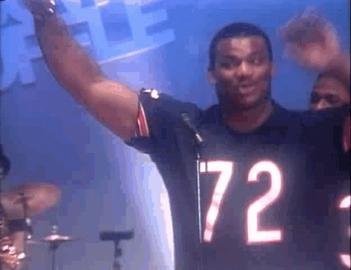A Man Wearing A Jersey That Says 72 On It GIF