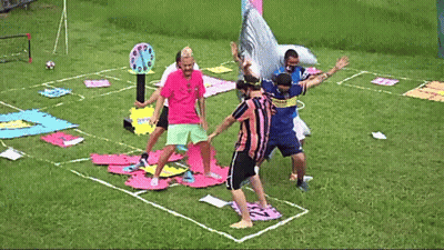 A Man Wearing A Jersey That Says ' Boca Juniors ' On It Stands On A Soccer Field GIF