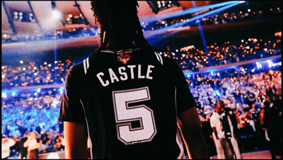 a man wearing a jersey that says castle 5