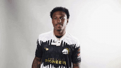 A Man Wearing A Jersey That Says Pioneers GIF