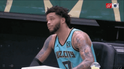A Man Wearing A Jersey That Says Wiz City GIF