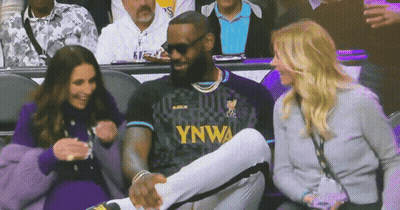 A Man Wearing A Jersey That Says Ynwa Sits In The Stands GIF