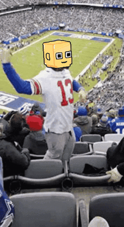 A Man Wearing A Jersey With The Number 13 On It Stands In A Stadium GIF