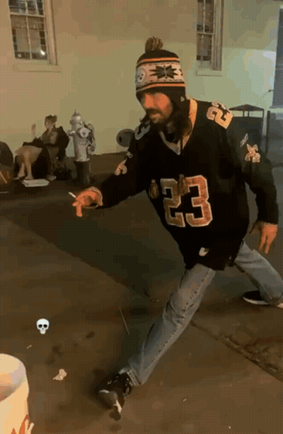 A Man Wearing A Jersey With The Number 23 On The Front GIF