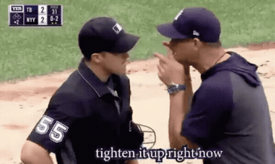 A Man Wearing A Jersey With The Number 55 On It Talks To Another Man GIF