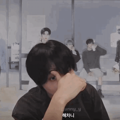 A Man Wearing A Jjunny_y Shirt Covering His Nose GIF