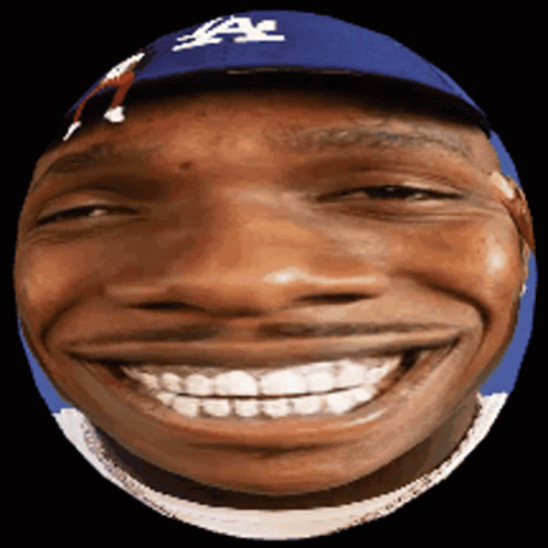 A Man Wearing A La Dodgers Hat Smiles With His Mouth Wide Open GIF