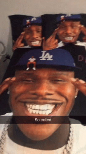 A Man Wearing A La Hat Is Smiling And Has The Word So Exited On His Face GIF