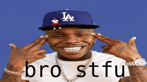 A Man Wearing A La Hat With A Man Sitting On Top Of It GIF