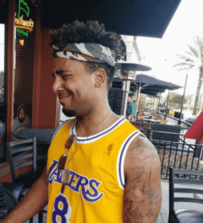 A Man Wearing A Lakers Jersey With The Number 8 GIF