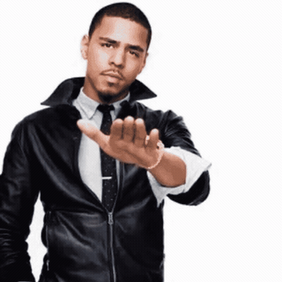 A Man Wearing A Leather Jacket And Tie Is Making A Stop Gesture GIF