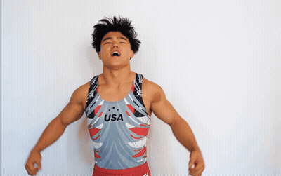 A Man Wearing A Leotard That Says Usa On The Front GIF