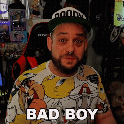 A Man Wearing A Looney Tunes Shirt Says " Bad Boy " GIF