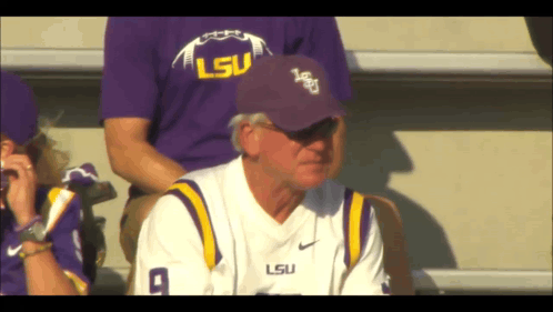 A Man Wearing A Lsu Jersey And Hat GIF