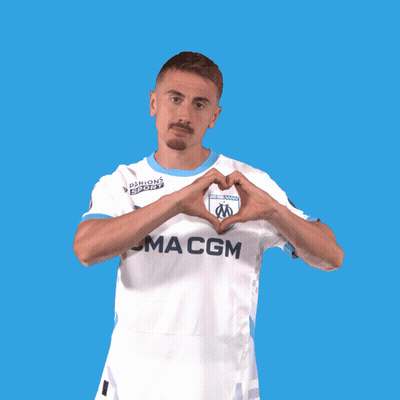A Man Wearing A Ma Cgm Jersey Making A Heart Shape With His Hands GIF