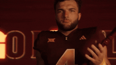 A Man Wearing A Maroon Jersey With The Number Four On It GIF