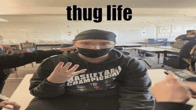A Man Wearing A Mask And A Hoodie That Says Basketball Champions GIF