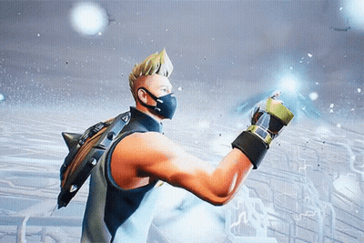 A Man Wearing A Mask And Gloves Is Standing In Front Of A Snowy Field GIF