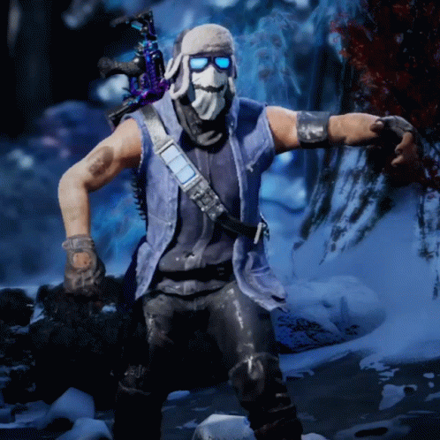 A Man Wearing A Mask And Sunglasses Stands In A Snowy Area GIF