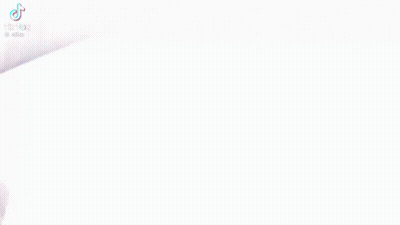 A Man Wearing A Mask Is Talking To Another Man While Holding A Piece Of Paper GIF