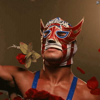 A Man Wearing A Mask That Says American GIF