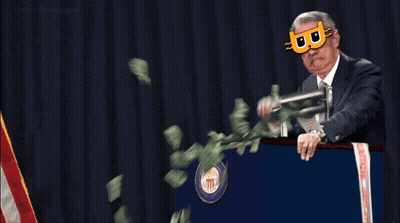 A Man Wearing A Mask With The Letter B On It Stands Behind A Podium GIF