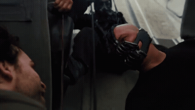 A Man Wearing A Mask With The Words The Fire Rises On The Bottom GIF