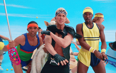 A Man Wearing A Metallica Belt Is Surrounded By Other People GIF