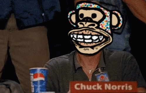 A Man Wearing A Monkey Mask Sits At A Table With A Pepsi Can GIF