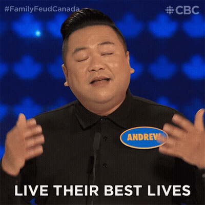 A Man Wearing A Name Tag That Says Andrew On It GIF