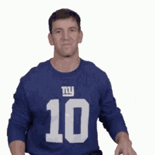 A Man Wearing A New York Giants Jersey Waving GIF