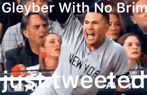 A Man Wearing A New York Jersey Is Screaming In The Crowd GIF