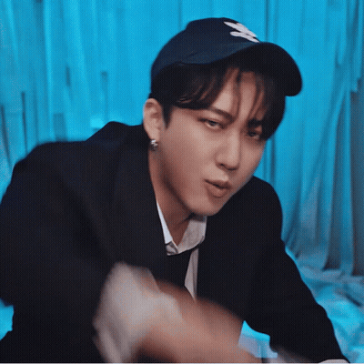 A Man Wearing A New York Yankees Baseball Cap GIF