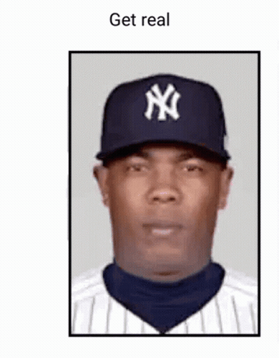 A Man Wearing A New York Yankees Hat And Striped Shirt Is Looking At The Camera . GIF