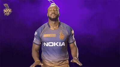 A Man Wearing A Nokia Shirt Is Standing In Front Of A Purple Background GIF