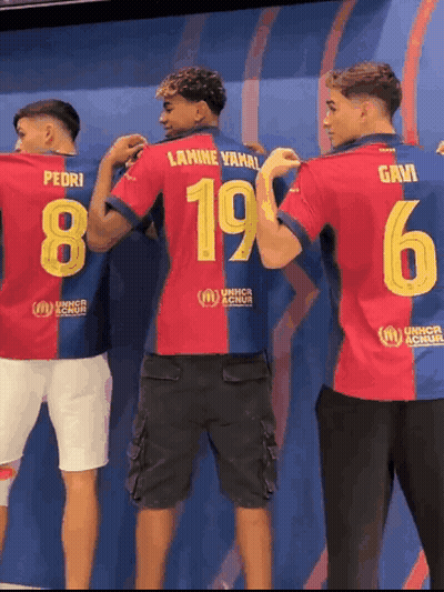A Man Wearing A Number 19 Jersey Stands Next To Another Man Wearing A Number 6 Jersey GIF