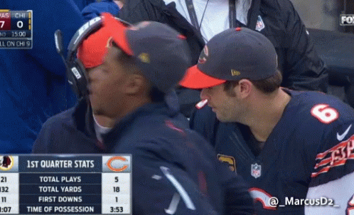 A Man Wearing A Number 6 Jersey Talks To Another Man Wearing A Hat GIF