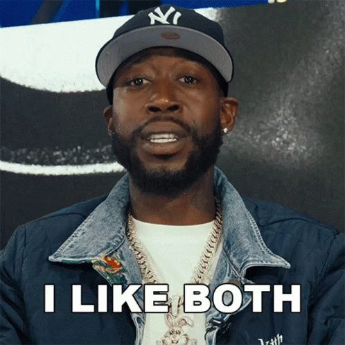 A Man Wearing A Ny Hat And A Jacket Says I Like Both GIF
