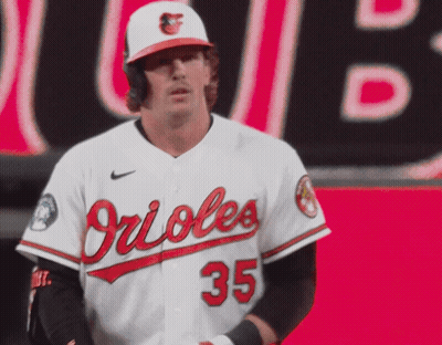 A Man Wearing A Orioles Jersey With The Number 35 GIF