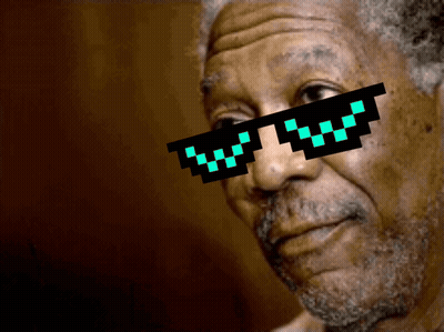 A Man Wearing A Pair Of Pixelated Sunglasses Looks At The Camera GIF