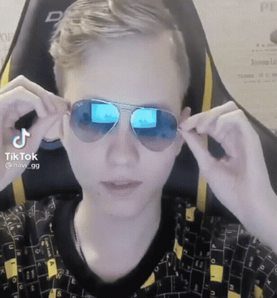 A Man Wearing A Pair Of Sunglasses With A Tiktok Watermark On It GIF