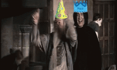 a man wearing a party hat that says prince