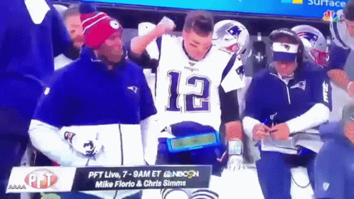 A Man Wearing A Patriots Jersey With The Number 12 On The Front GIF