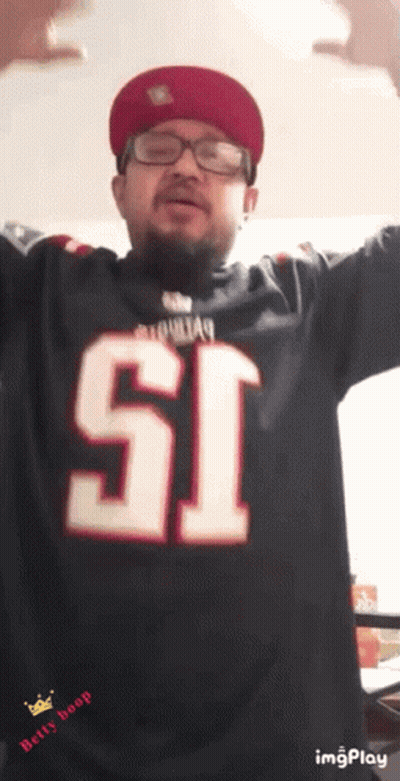 A Man Wearing A Patriots Jersey With The Number 51 GIF
